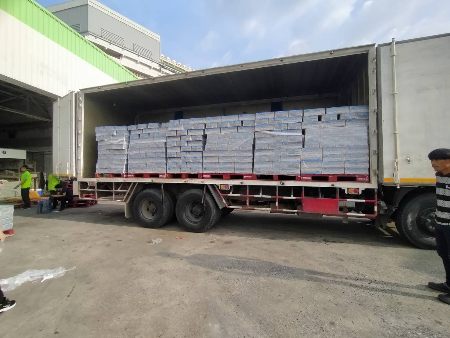 Warehouse with delivery trucks